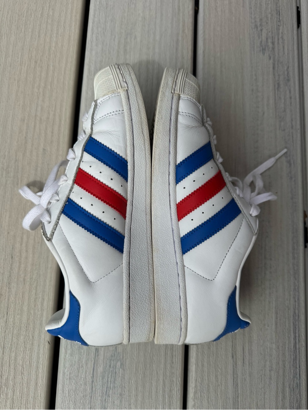 Adidas White Sneakers with Blue and Red Stripes
